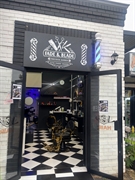 high-traffic barber shop with - 1